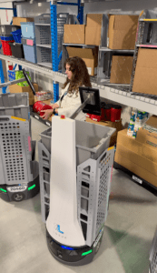 Woman working with Locus Robots for Fast Pick