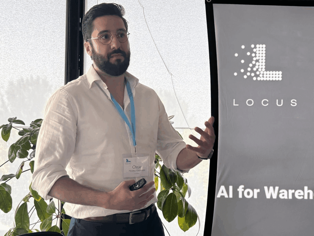 Man presenting at a conference