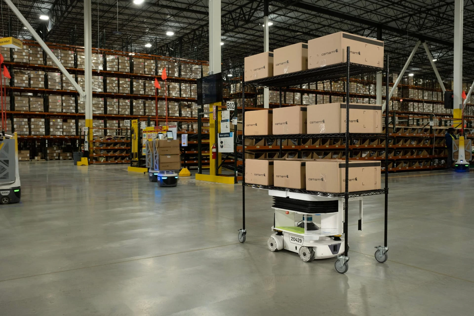 Locus Vector operating in an existing warehouse aisle