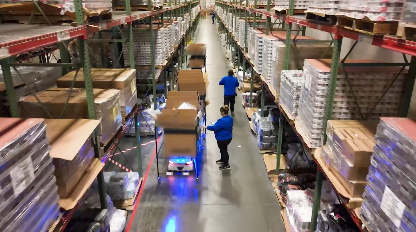 Locus Vector transporting a loaded cart